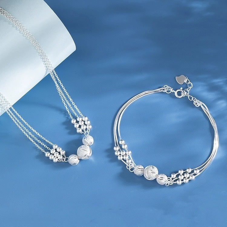 🔥【Kupite jedan, dobijte drugi gratis】🔥✨Lagana i luksuzna ogrlica + narukvica od perli za sreću